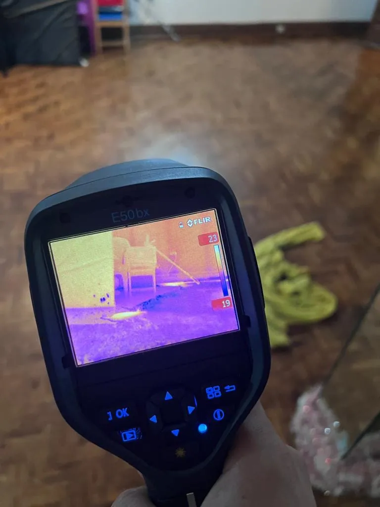 Thermal camera finding water under a hardwood floor